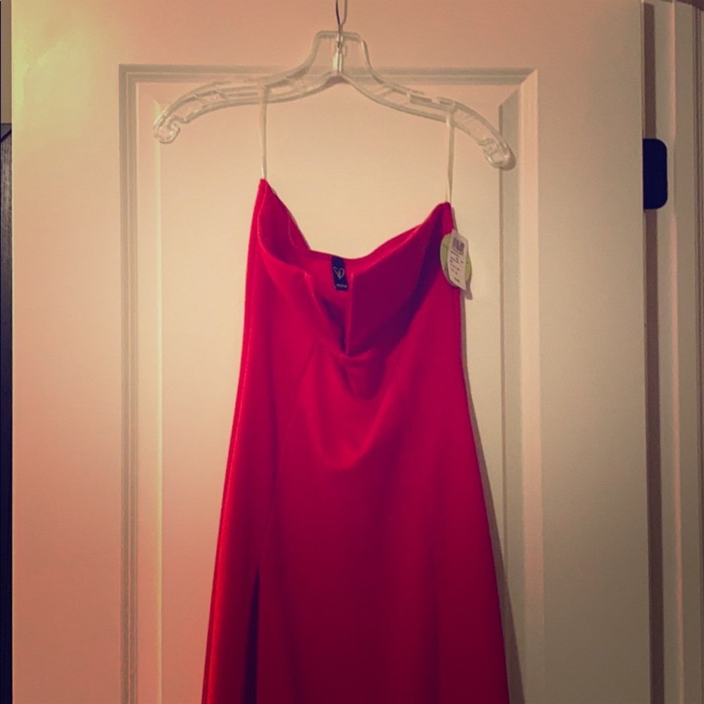 Red dress with slit up right leg